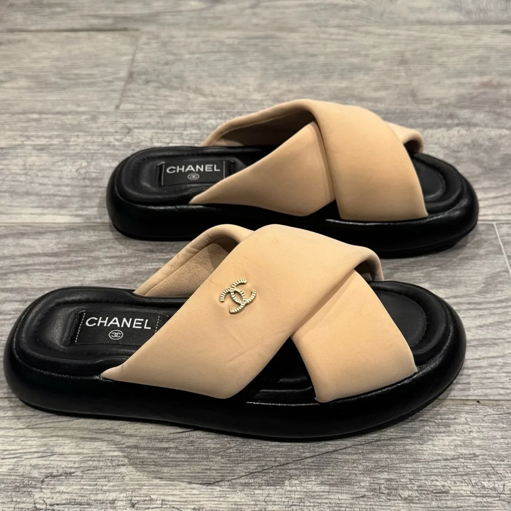 Chanel beige black Rev criss cross puffy CC logo slide sandals